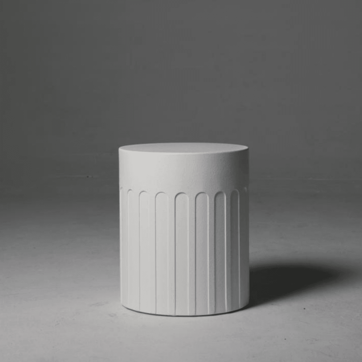 A white round Arch White Side Table with a curved arch-shaped design, presented on a neutral background.