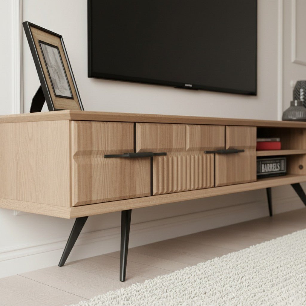 Side angled shot highlighting the walnut wood frame, open storage shelves, and black angled metal legs.