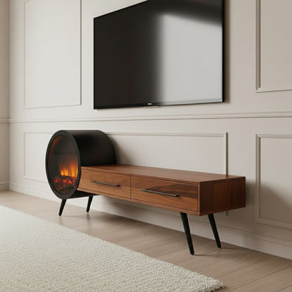 Aura Fireplace Tv Unit Walnut. Mid-century modern walnut TV console with two drawers and a distinctive round black electric fireplace integrated on the left side, supported by black angled legs beneath a wall-mounted television.