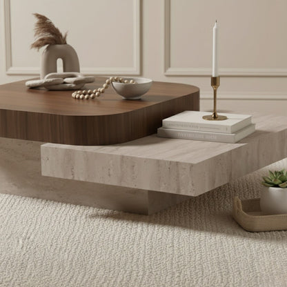 Modern coffee table with decorative items in a stylish living room.