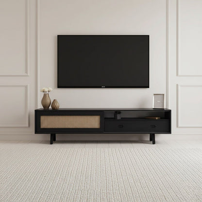 Finn Tv Unit black 200cm. Mid-century modern black media console featuring a printed cane-front sliding cabinet door on the left, two drawers, and an open center shelf, supported by black angled metal legs beneath a wall-mounted TV.