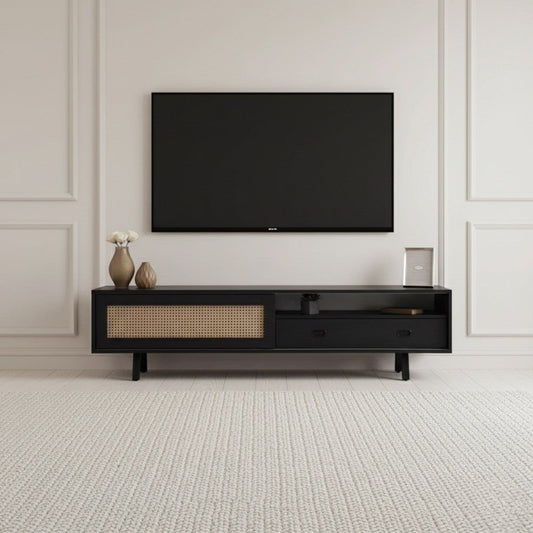 Finn Tv Unit black 200cm. Mid-century modern black media console featuring a printed cane-front sliding cabinet door on the left, two drawers, and an open center shelf, supported by black angled metal legs beneath a wall-mounted TV.