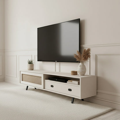 Finn Tv Unit Cream 200cm. Angled shot of the cream media console, highlighting the contrast between the printed woven rattan/cane-front sliding cabinet door and the smooth storage drawer with a black oval pull handle, supported by black angled legs.