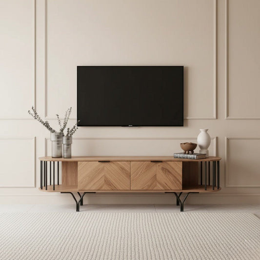 Foster TV Unit 200cm. Modern two-toned TV unit made of light color wood with a long, open shelf design, featuring two central cabinets with chevron-patterned wood doors. The sides have decorative vertical black metal bars, and the unit is supported by stylish black metal legs, offering a contemporary and spacious media storage solution for the living room.