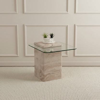 Glass table with a travertine base in a room with paneled walls.