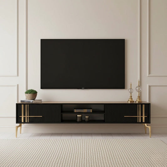 Lincoln Wooden Tv Unit Black 200cm. Elegant, wide black media console featuring two ribbed storage cabinets with vertical gold accents and gold handles, an open center shelf, a light wood top, and supported by angled gold metal legs beneath a wall-mounted TV.