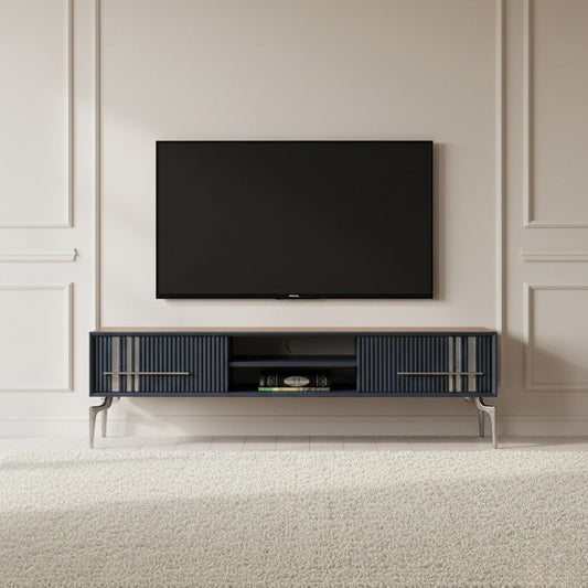Lincoln Wooden Tv Unit Grey 200cm. Elegant, wide media console in a grey color, featuring two ribbed storage cabinets with silver handles and light wood accents, an open center shelf for media devices, and supported by angled silver-toned metal legs.