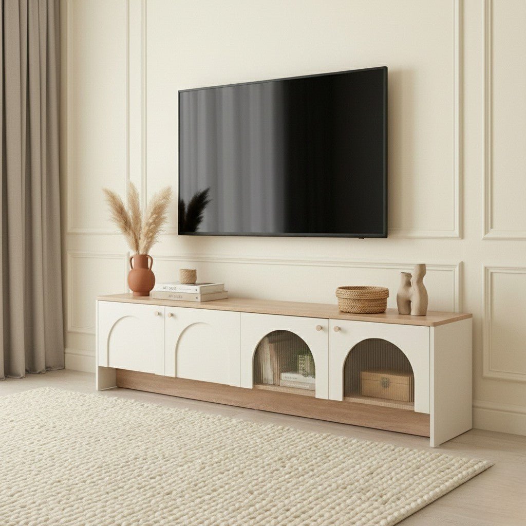 Modern living room with a TV mounted on the wall above a wooden entertainment console.