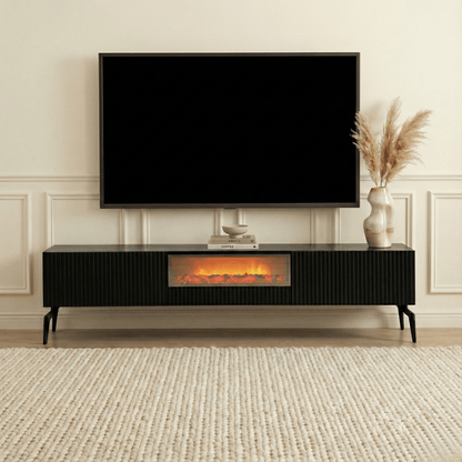 Modern living room with a television mounted on the wall above an electric fireplace.