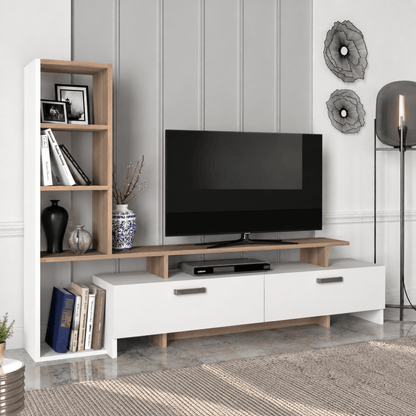 A modern white TV stand with light wood accents and open shelving, styled in a living room setting with a television, books, and decorative vases.