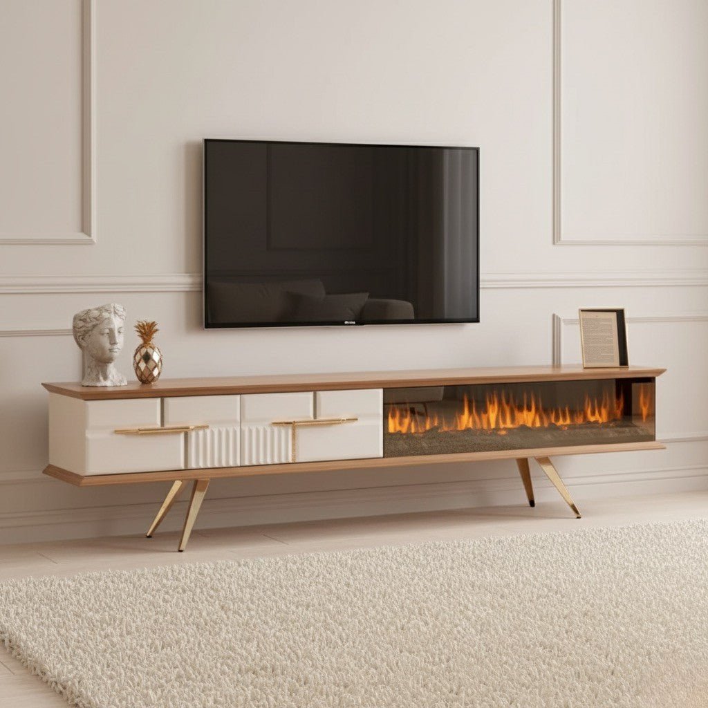 Tribe Wooden Fire TV Unit cream 200cm. This long, modern media console features a wood top and cream base with two smooth and two ribbed storage drawers with gold handles, and a spacious integrated electric fireplace, all supported by elegant gold angled legs.