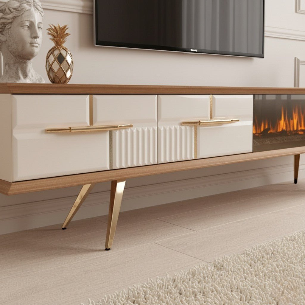 Tribe Wooden Fire TV Unit cream 200cm. Close-up detail of the cream and wood media console, highlighting the two storage drawers with glossy finish, gold horizontal pull handles, vertical ribbed texture accents, and the unit's angled gold metal legs.
