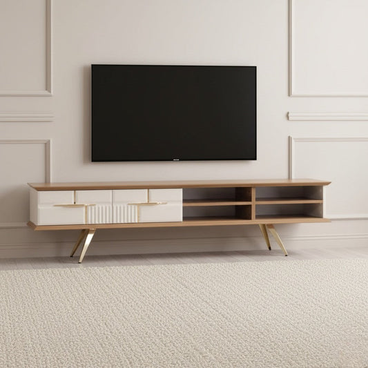 Tribe Wooden Tv Unit Cream 200cm. Wide media console featuring a wood frame and four cream-colored storage drawers with gold handles (two smooth, one ribbed texture), plus open shelving on the right, supported by angled gold metal legs beneath a wall-mounted TV.